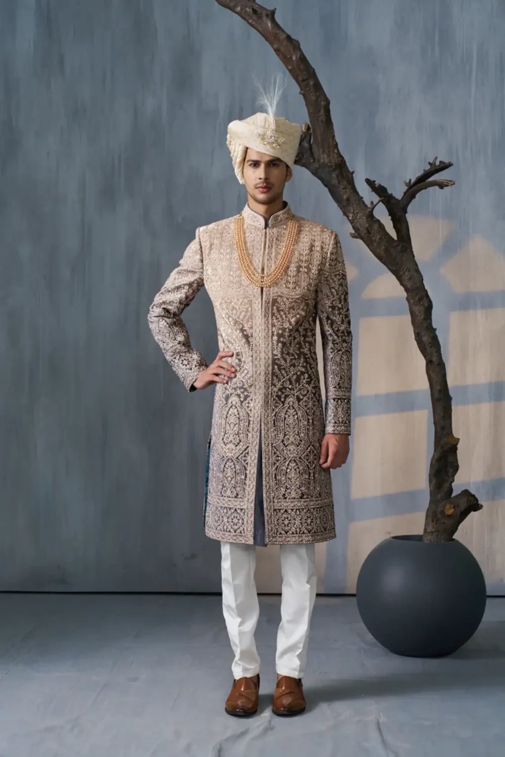 GREEN SHERWANI SET WITH FLORAL MOTIFS AND MIRROR WORK