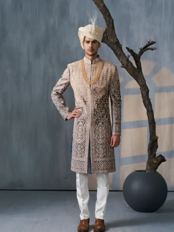 GREEN SHERWANI SET WITH FLORAL MOTIFS AND MIRROR WORK