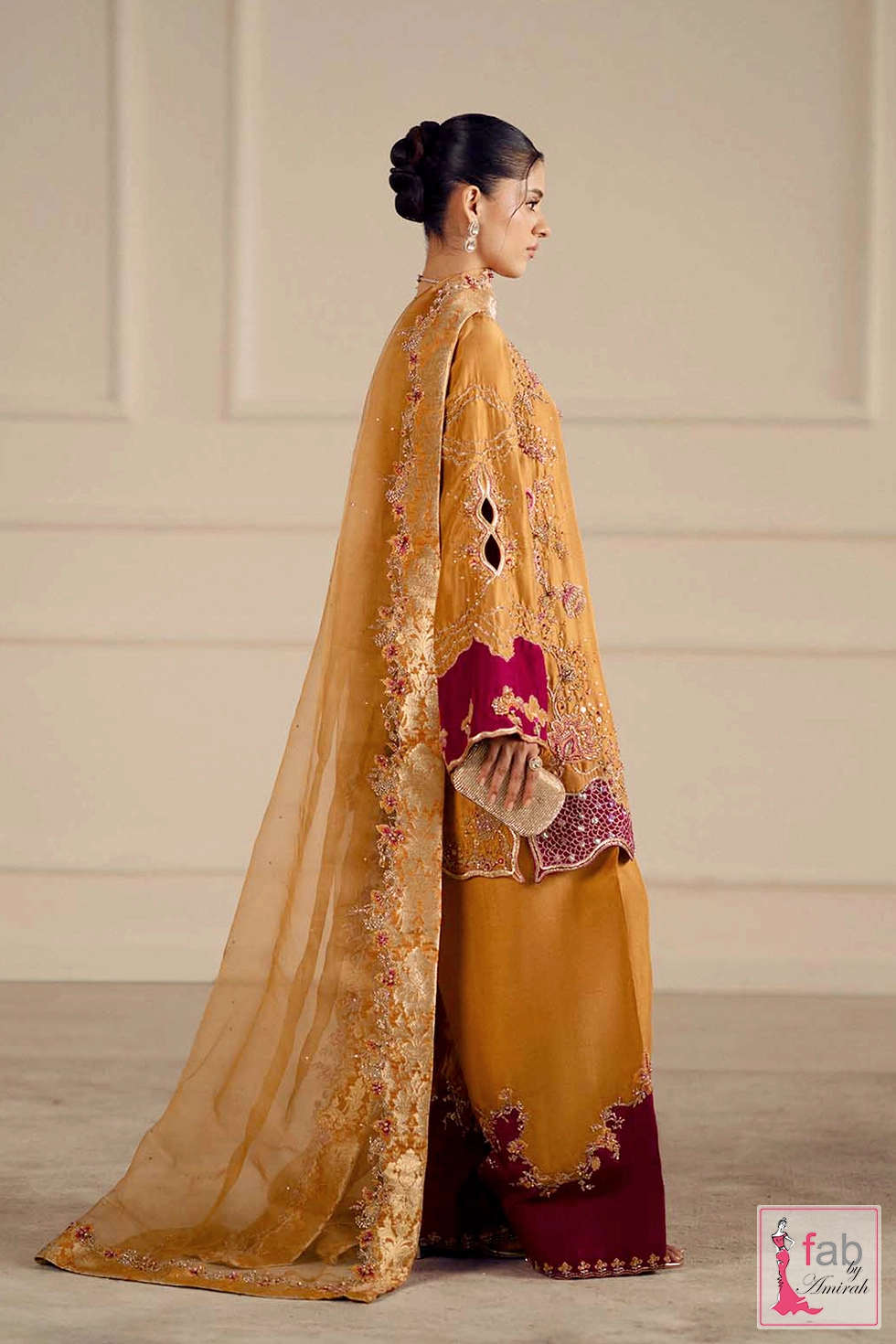Side profile shot showing full silhouette and layered dupatta drape