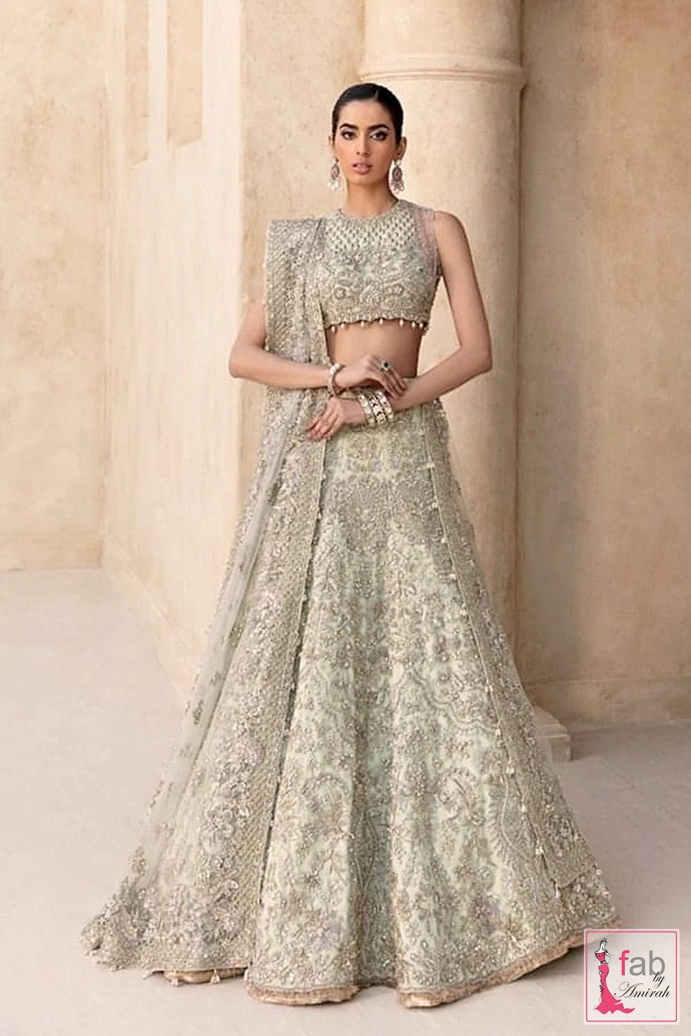 Mint green lehenga with heavy silver zardozi embroidery and pearl embellishments