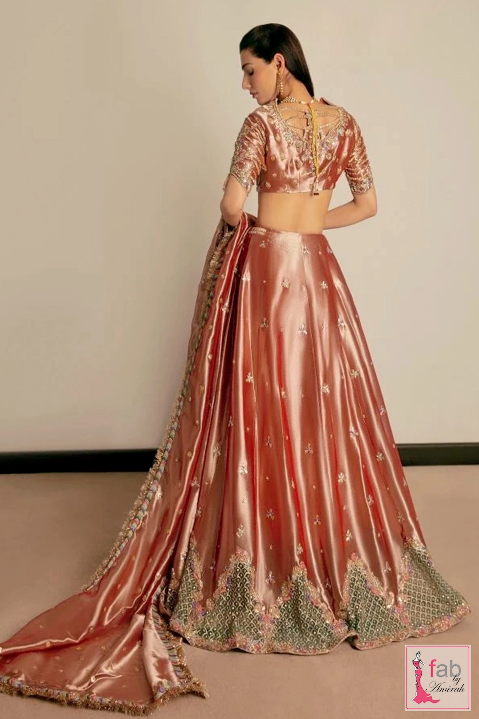 Full back view showing detailed back cutouts and trailing dupatta drape