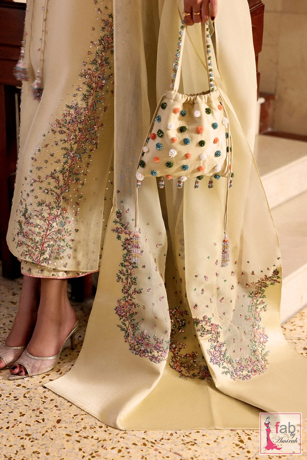 Detail shot showing floral embroidery, sequins, and cutdana work on side panels Detail shot showing floral embroidery, sequins, and cutdana work on side panels