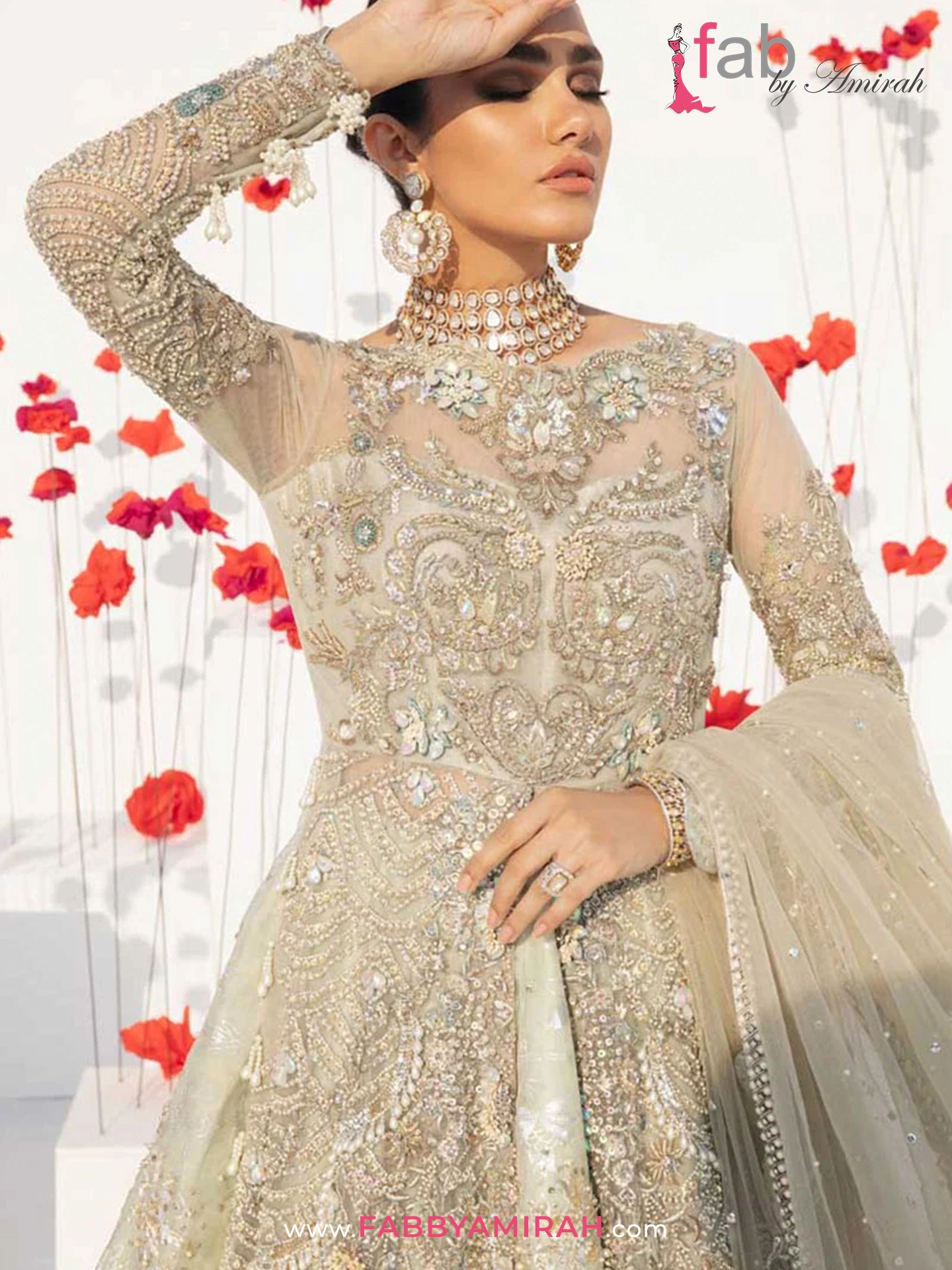 Close-up of Dabka and crystal work on mint green walima dress
