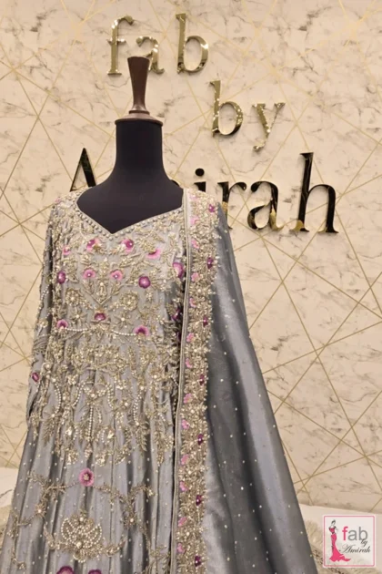 Medium view highlighting sheer embellished sleeves and dupatta border