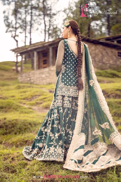 Back view of emerald gharara showing detailed booti work and hand-stitched borders