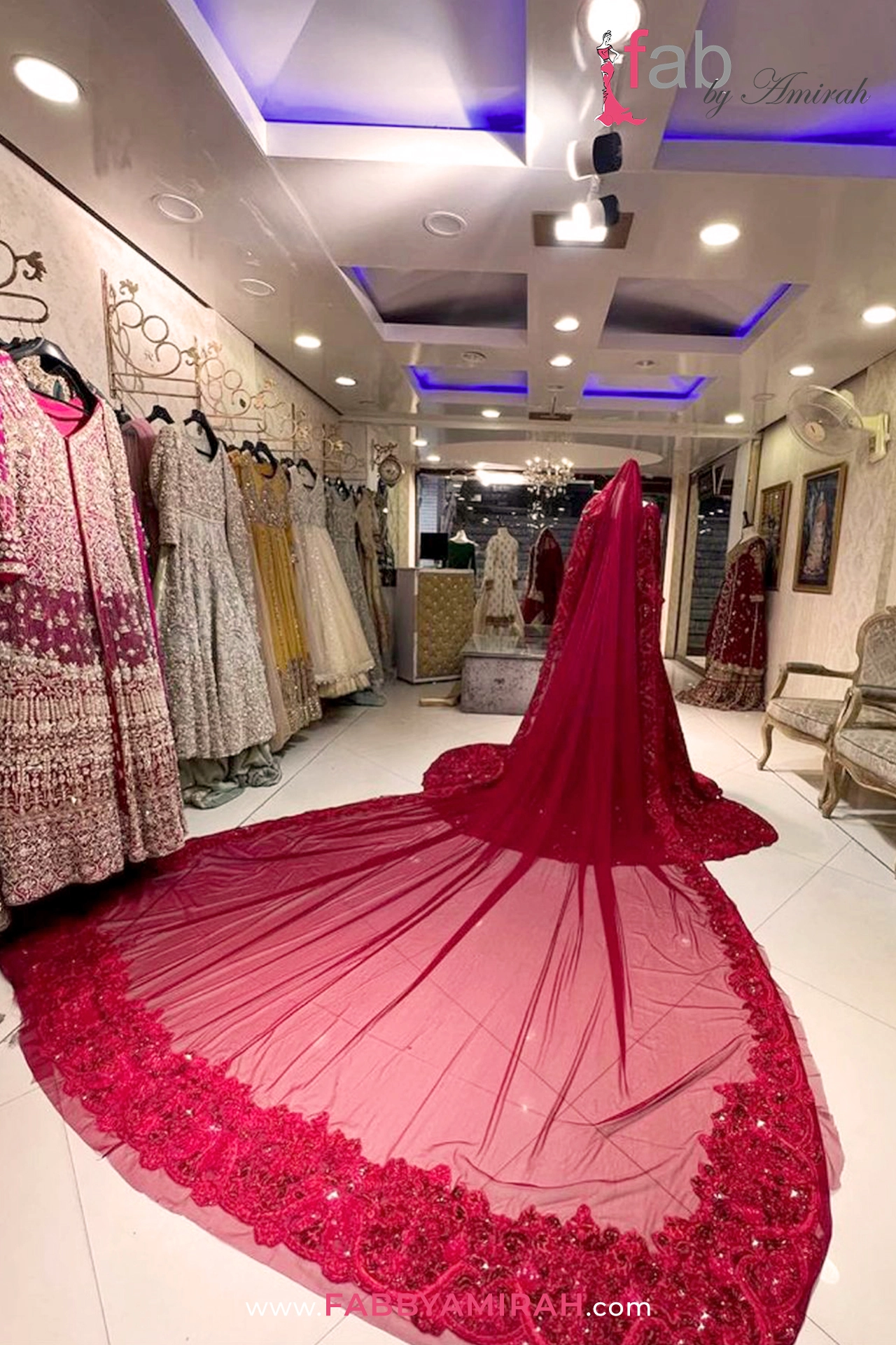Red bridal maxi with royal back trail styled for a luxury Walima ceremony