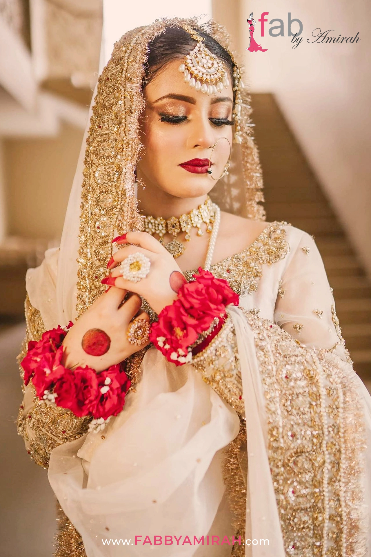 Close-up of handcrafted crystal and pearl work on off-white gharara dress for nikah