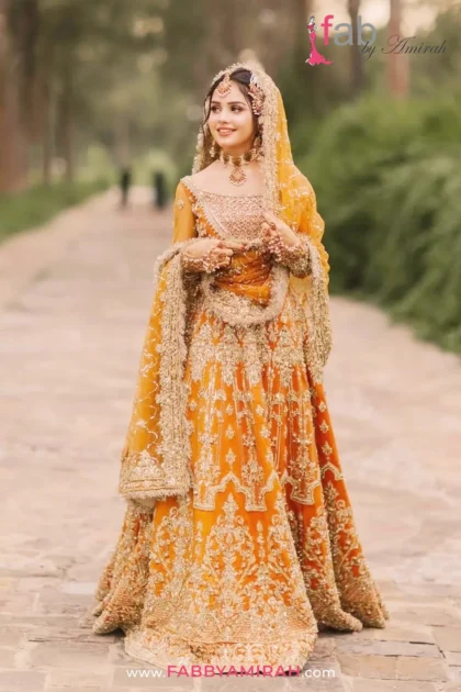 Close-up of handcrafted Dabka and Gota embellishments on luxury bridal lehnga