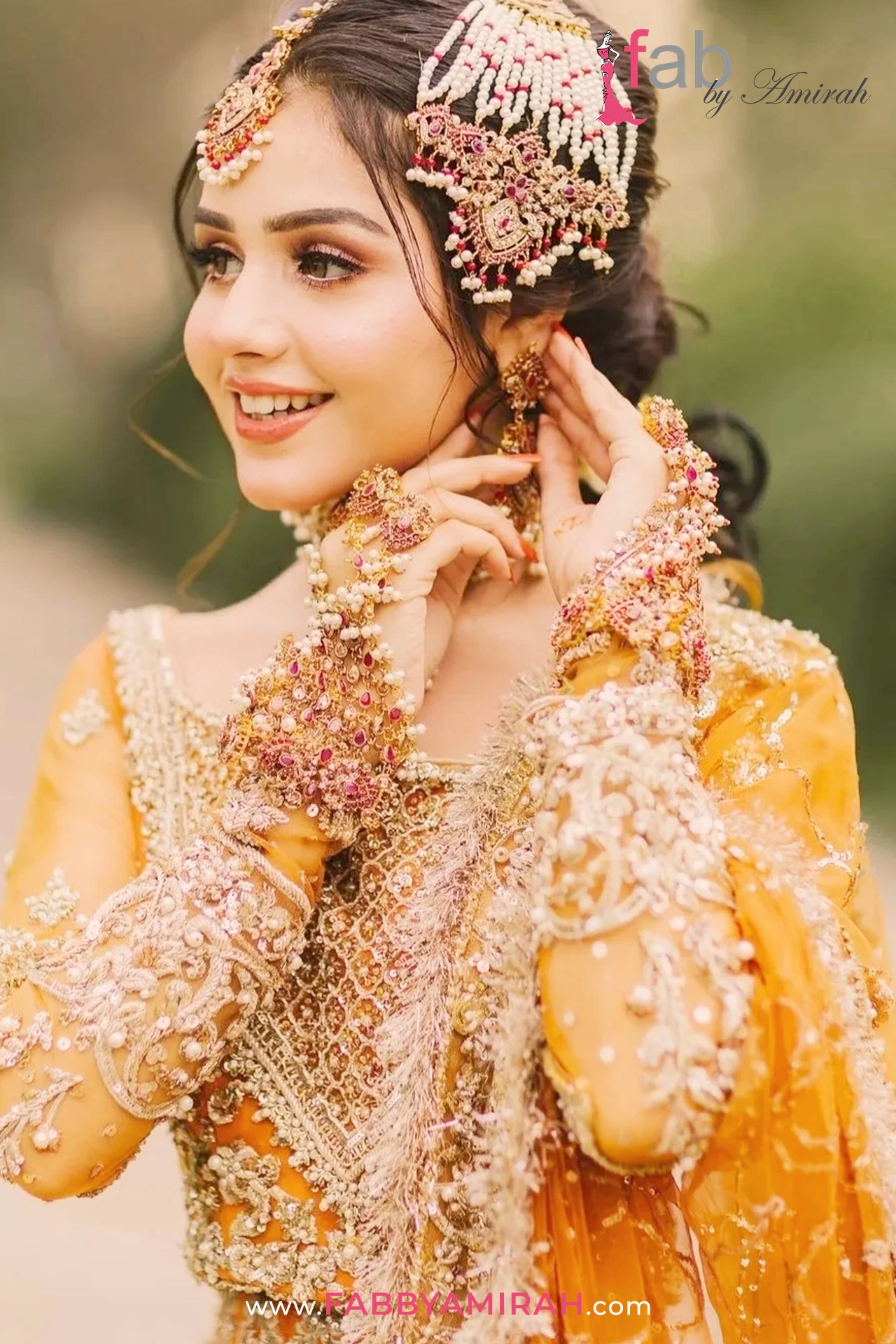 Close-up of handcrafted Dabka and Gota embellishments on luxury bridal lehnga