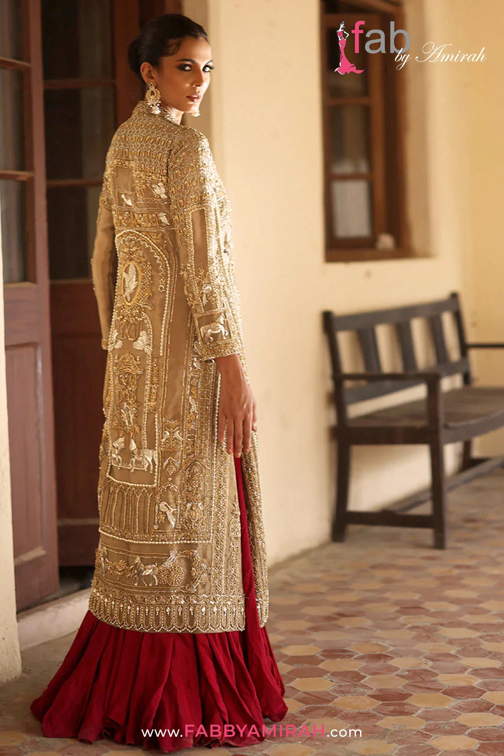 Back view of bridal front open long gown showing detailed crystal and pearl embellishments