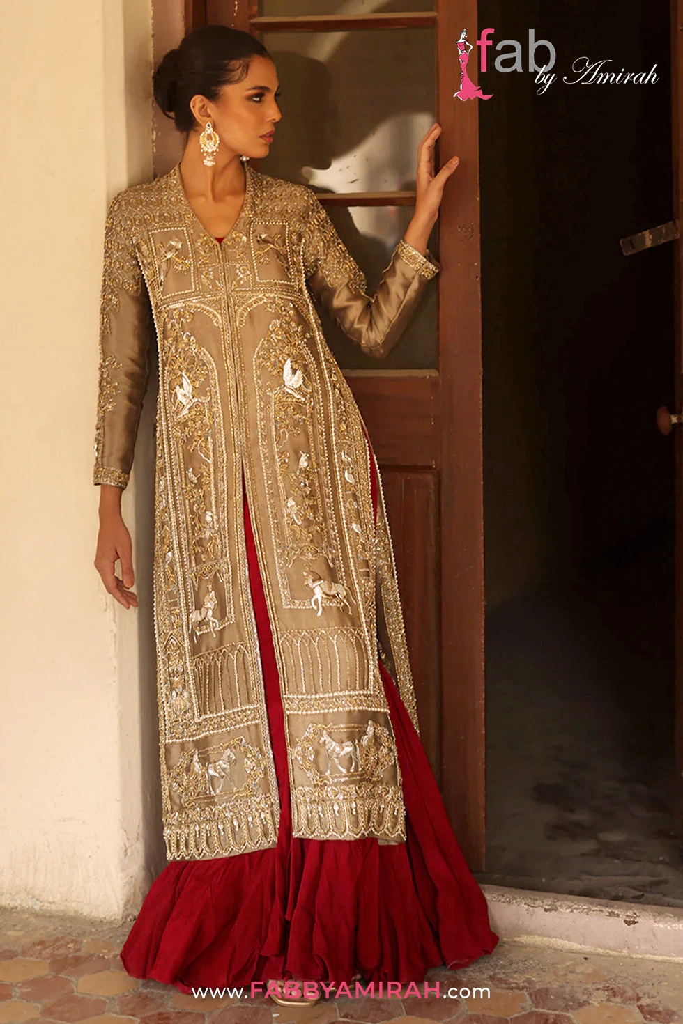 Close-up of Zardozi and Vasli hand-embroidery on gold front open long gown