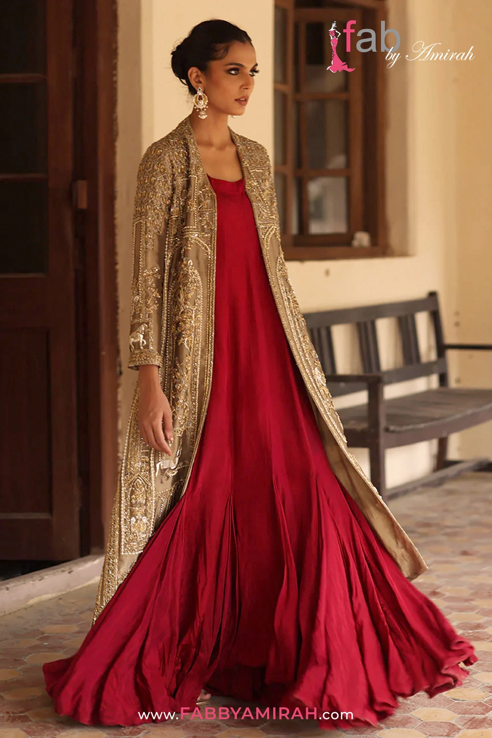 Front open long gown in metallic gold with architectural bird and horse embroidery by Fab By Amirah