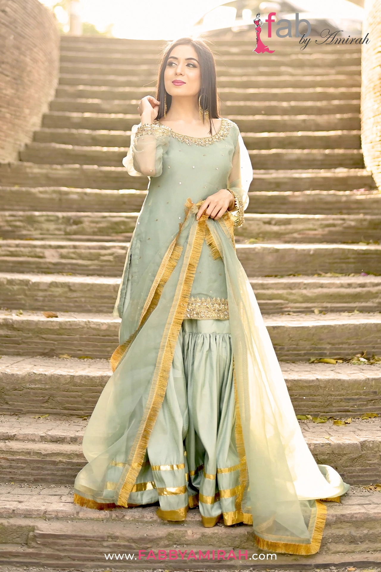 Complete light ferozi organza sharara set with festive hand-embroidery for wedding events Complete light ferozi organza sharara set with festive hand-embroidery for wedding events