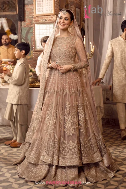 Peach pink walima pishwas with heavy Dabka and Resham work by Fab By Amirah
