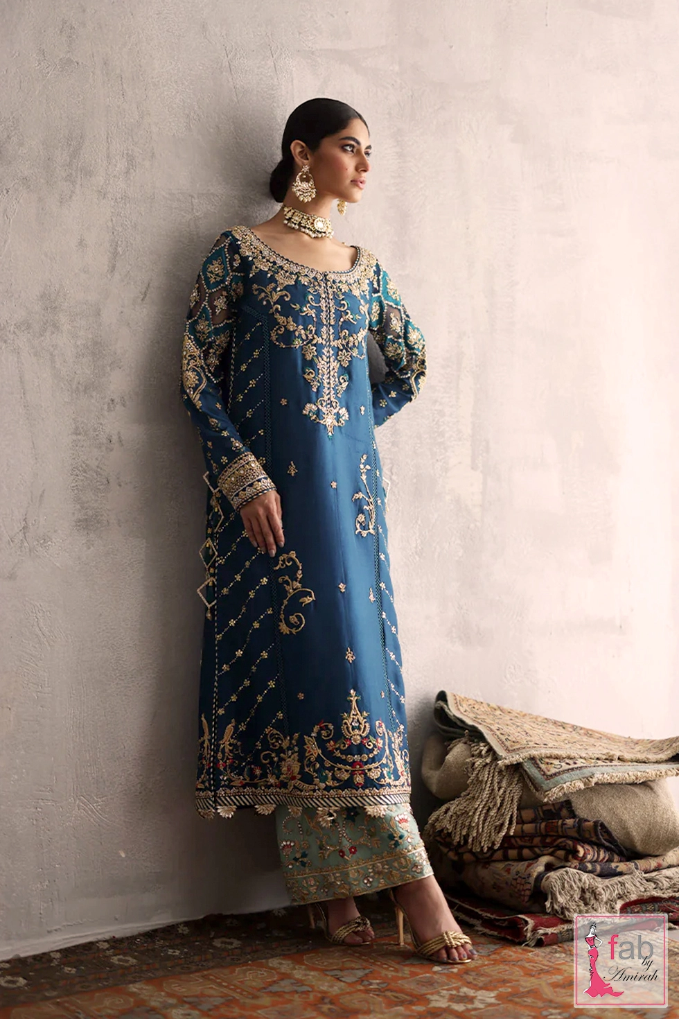 Handworked raw silk culottes paired with long blue formal tunic