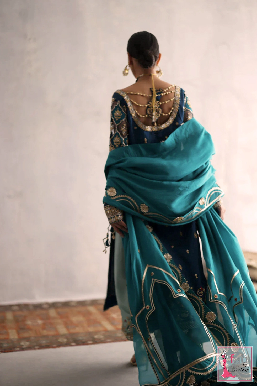 Emerald green pure organza dupatta with traditional embroidery accents