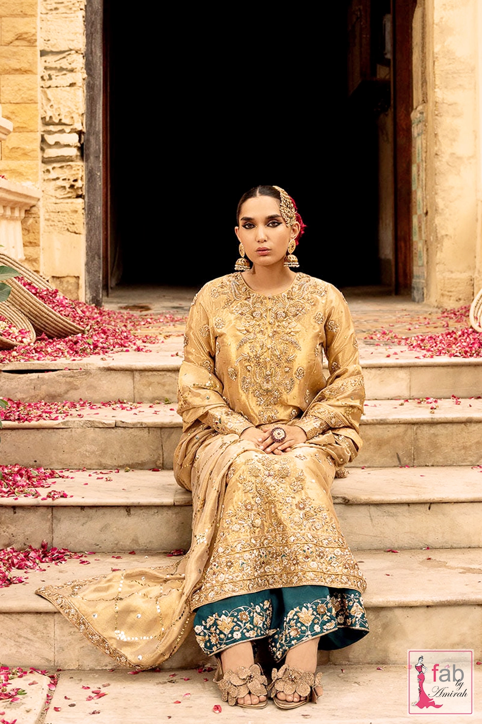 Teal green raw silk izaar pants with gold borders by Fab By Amirah