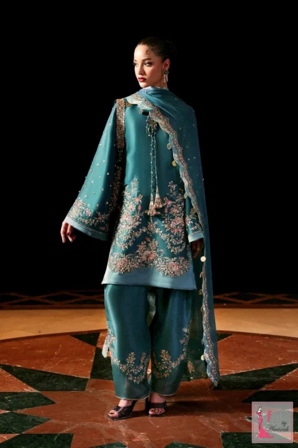 Teal blue hand embroidered party wear dress with embellished hem