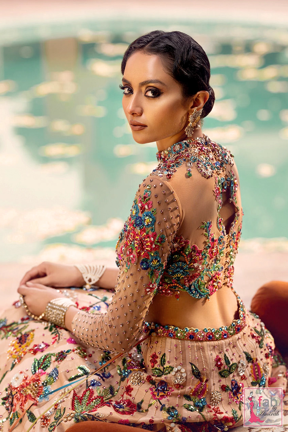 Close up back detail of high neck blouse with crystal embellishments