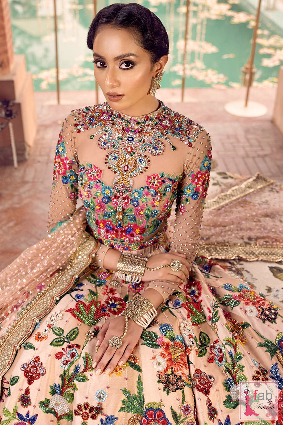 Front view showing detailed jewel collar and heavily decorated bodice