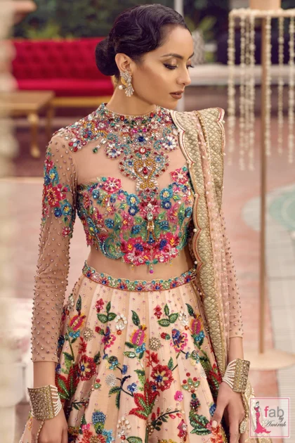 Close shot of long sleeves embellished with scattered crystals