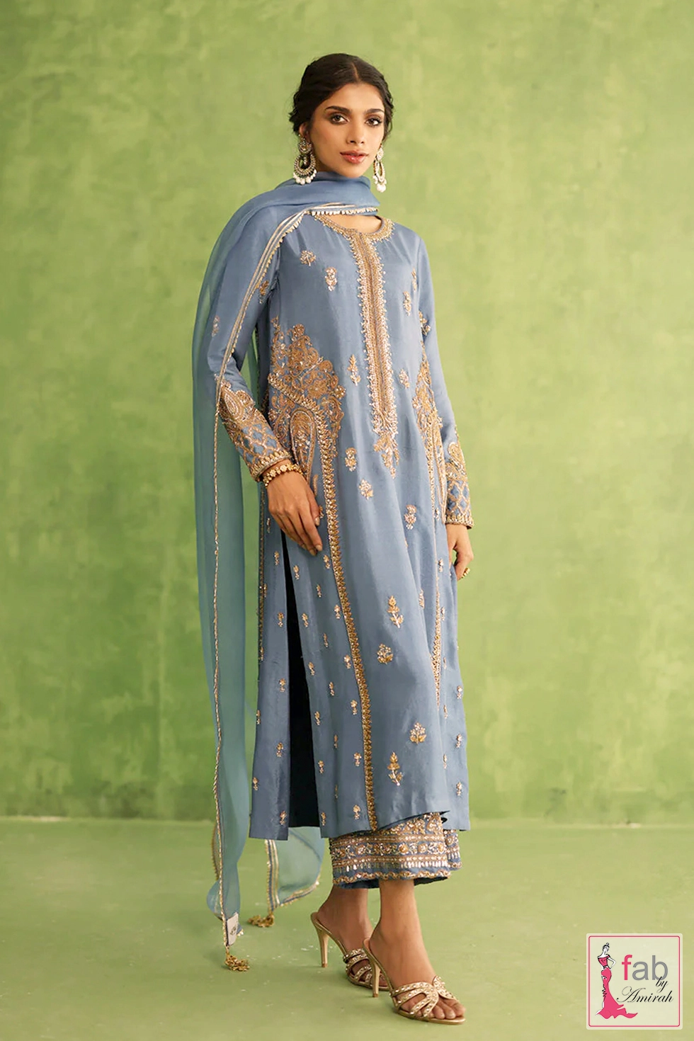 Intricate hand-embroidered sleeve cuffs showing traditional marori stitching panels Intricate hand-embroidered sleeve cuffs showing traditional marori stitching panels