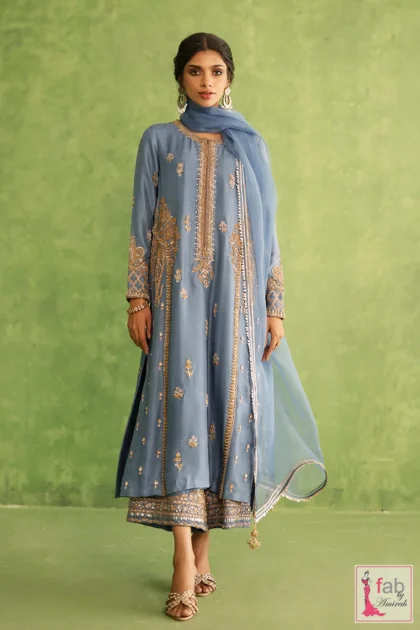 Close-up of zardozi work and gota lace on high collar
