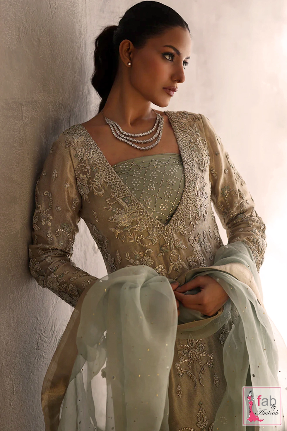 Close-up of silver zardozi embroidery on luxury ivory meysuri fabric