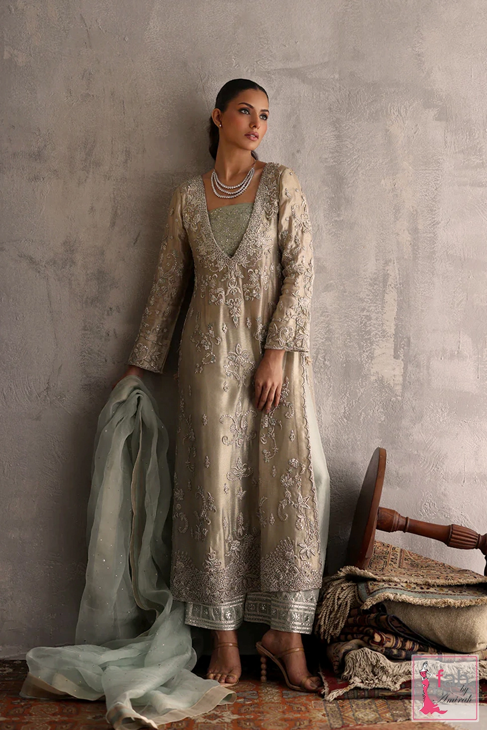Fine stitching details and gold tilla accents on premium festive kameez