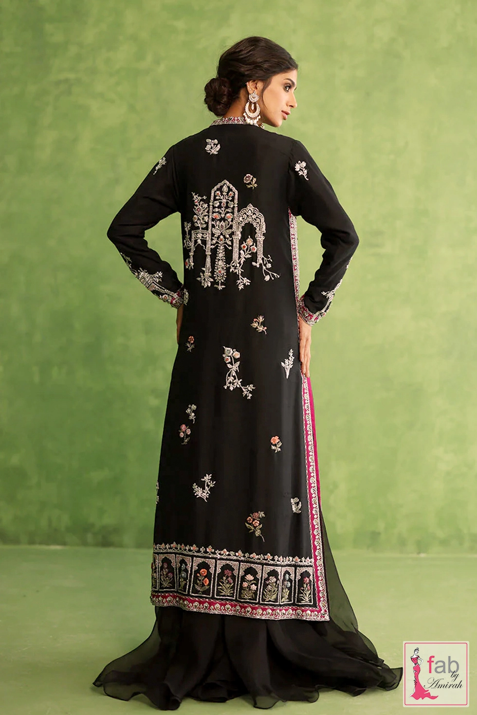 Intricate silver wire back motif layout on longline black gown