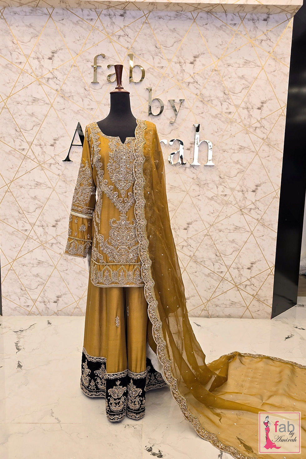 Mustard sharara suit with hand embroidered short shirt and flared bottom