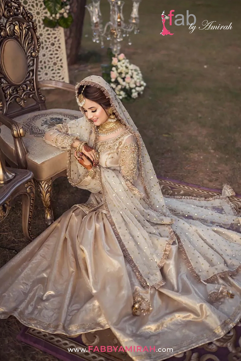 Off white organza engagement dress with gold embellishments by Fab By Amirah