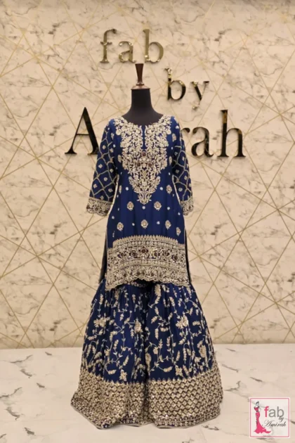 Side angle view showcasing the full length silhouette and draped dupatta