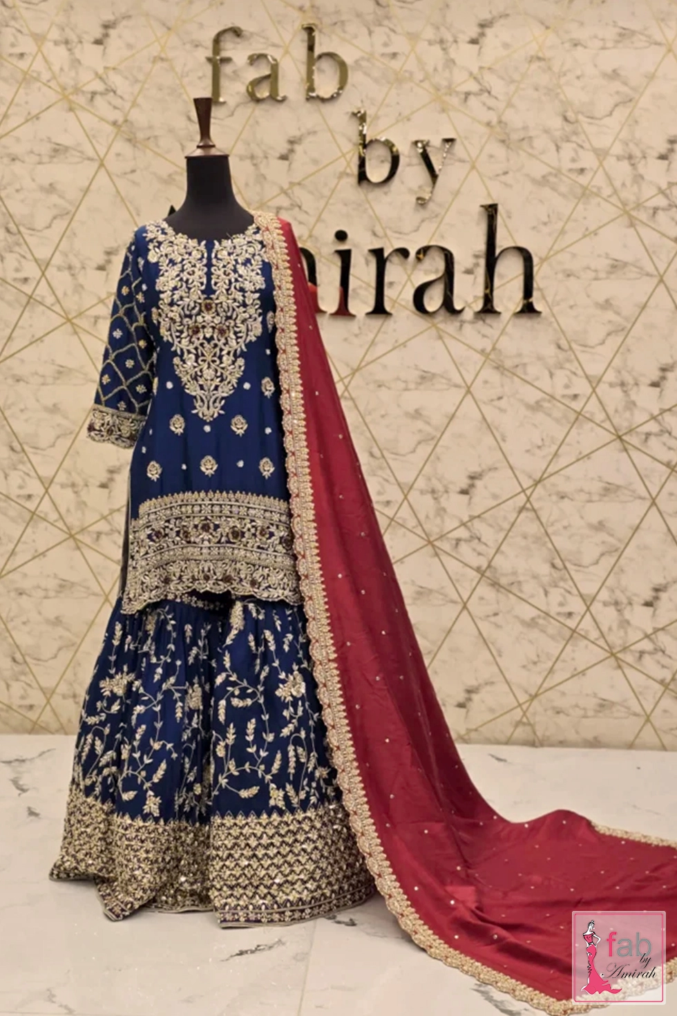 Royal blue embroidered party wear shirt paired with matching flared sharara pants