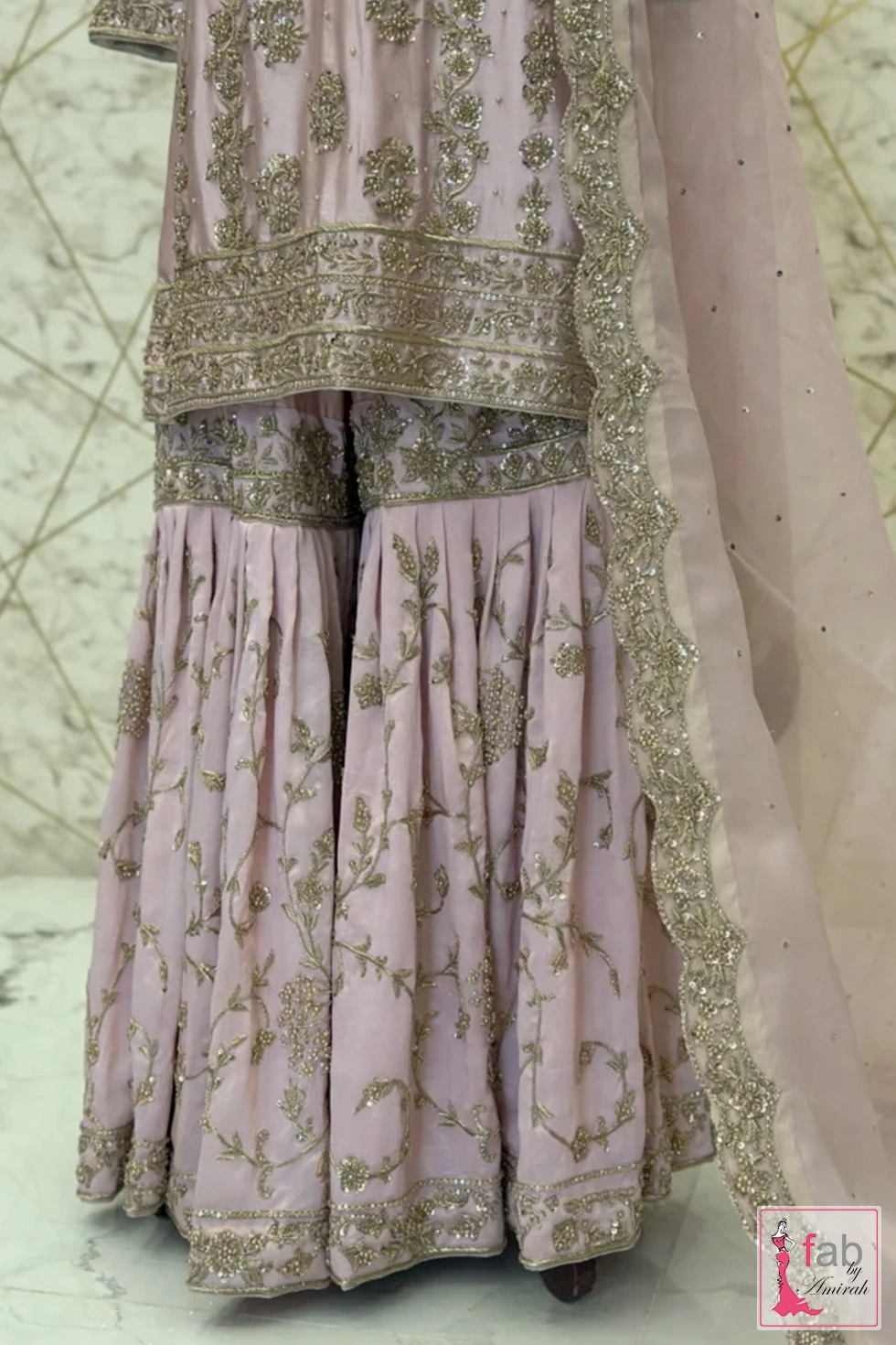 Lower shirt hemline and matching pleated gharara flare detail