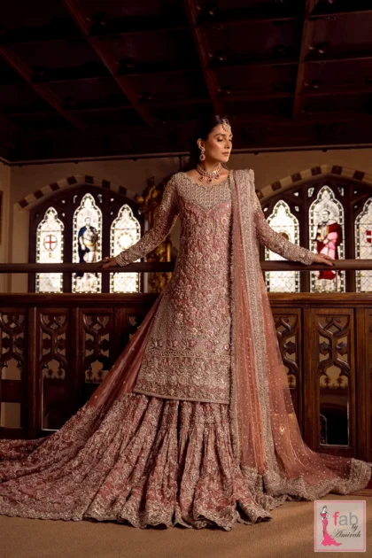 Full length view of peach bridal farshi gharara with heavy hand embroidered shirt