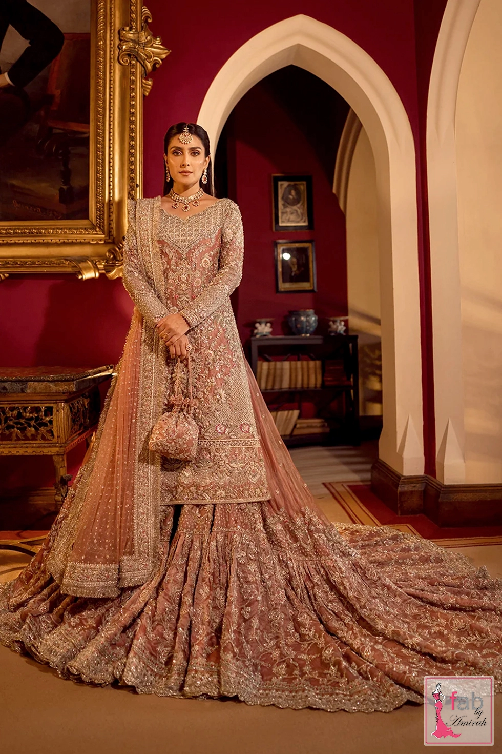 Seated full dress view displaying the expansive flare of the gharara skirt Seated full dress view displaying the expansive flare of the gharara skirt