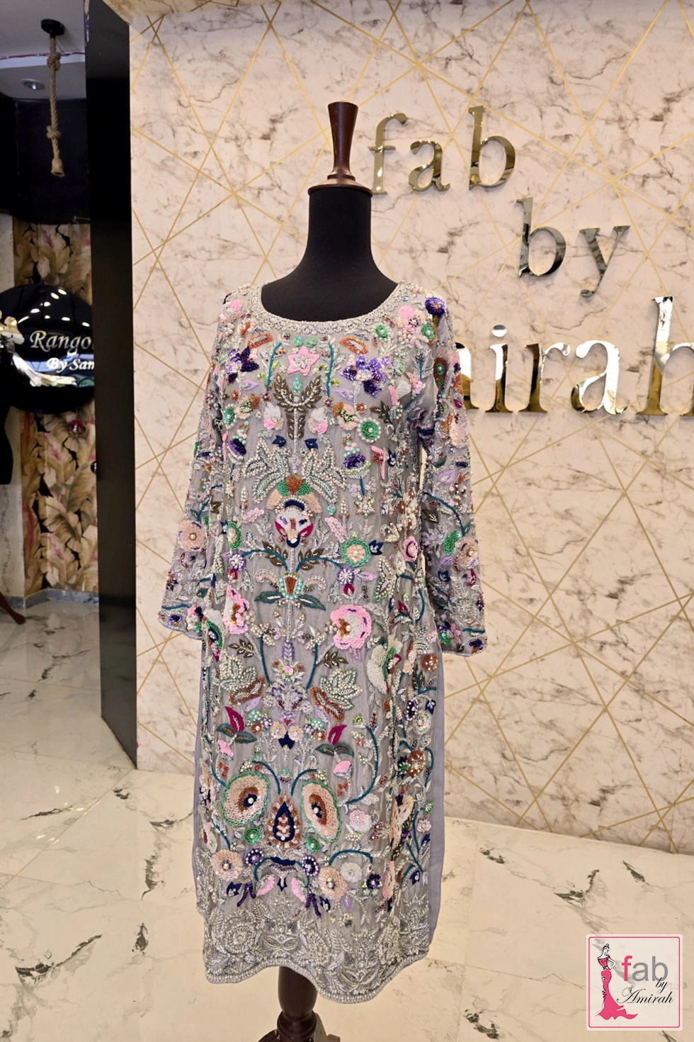 Full front view of grey hand embellished shirt showing overall silhouette