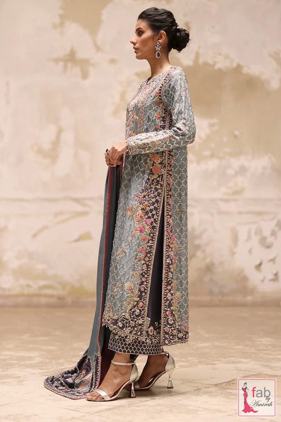 Side view showing side slits and embroidered raw silk izaar