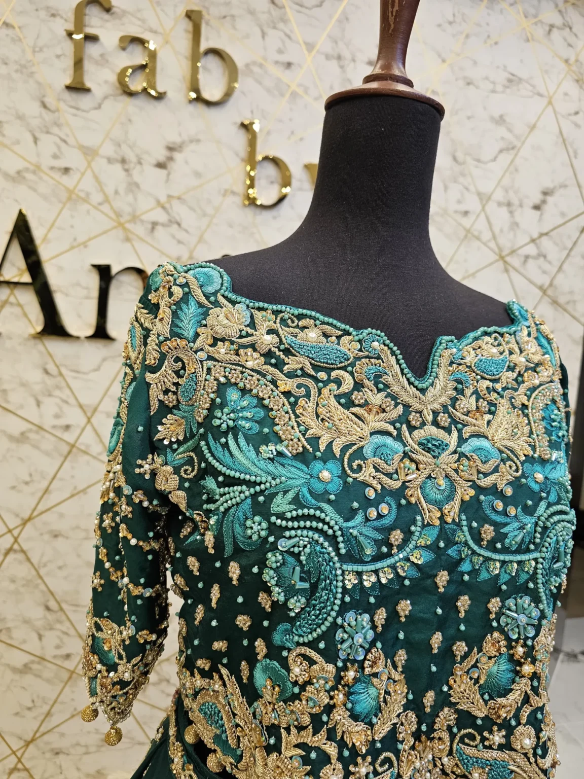 Green Bridal Lehnga with Gold Zardozi Work