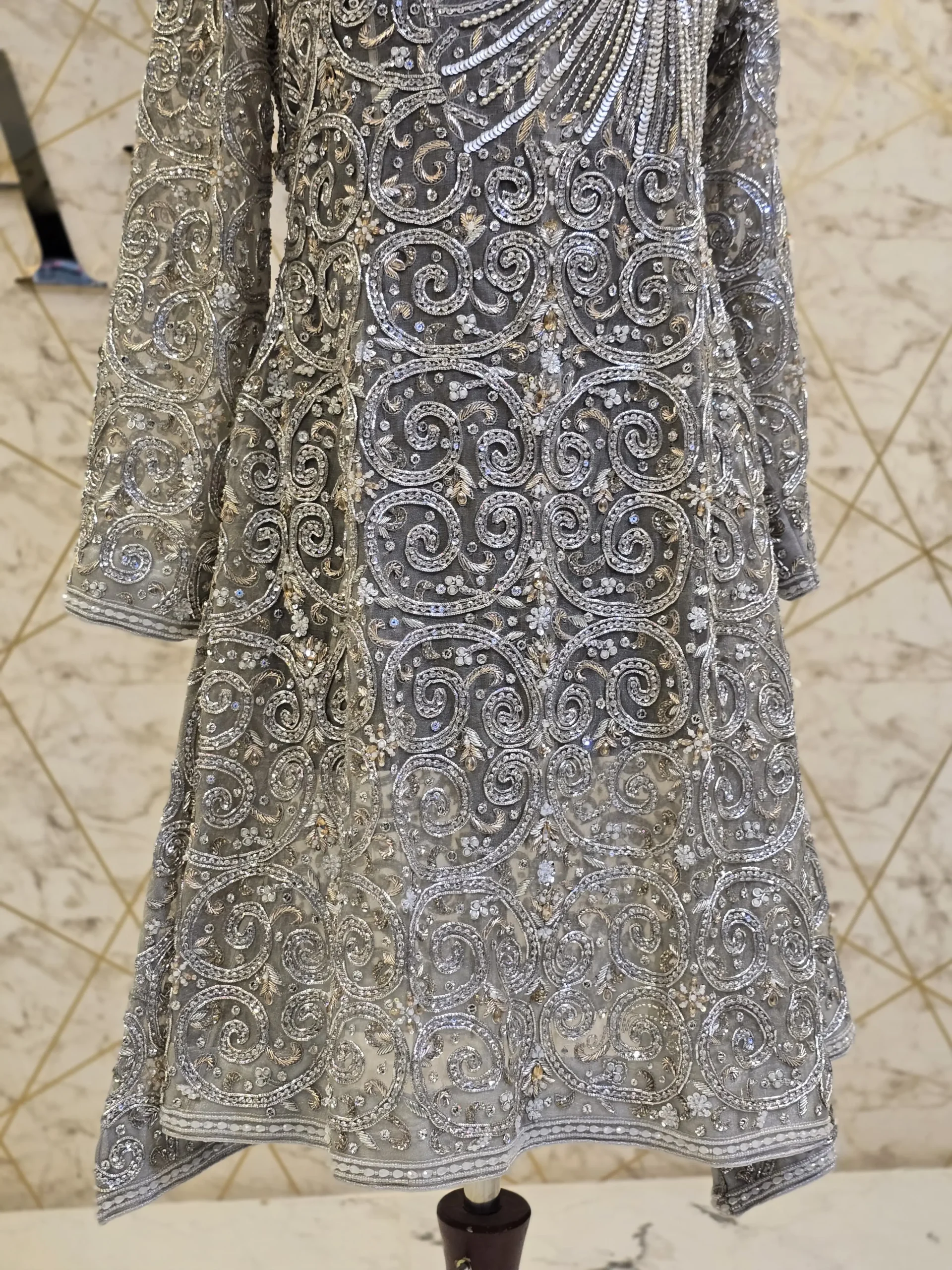 WhatsApp-Image-2025-06-09-at-15.48.35_22ee957b-convert.io_-scaled-1-1.webp Shimmering Hand-Embroidered Chandi Tissue Shirt