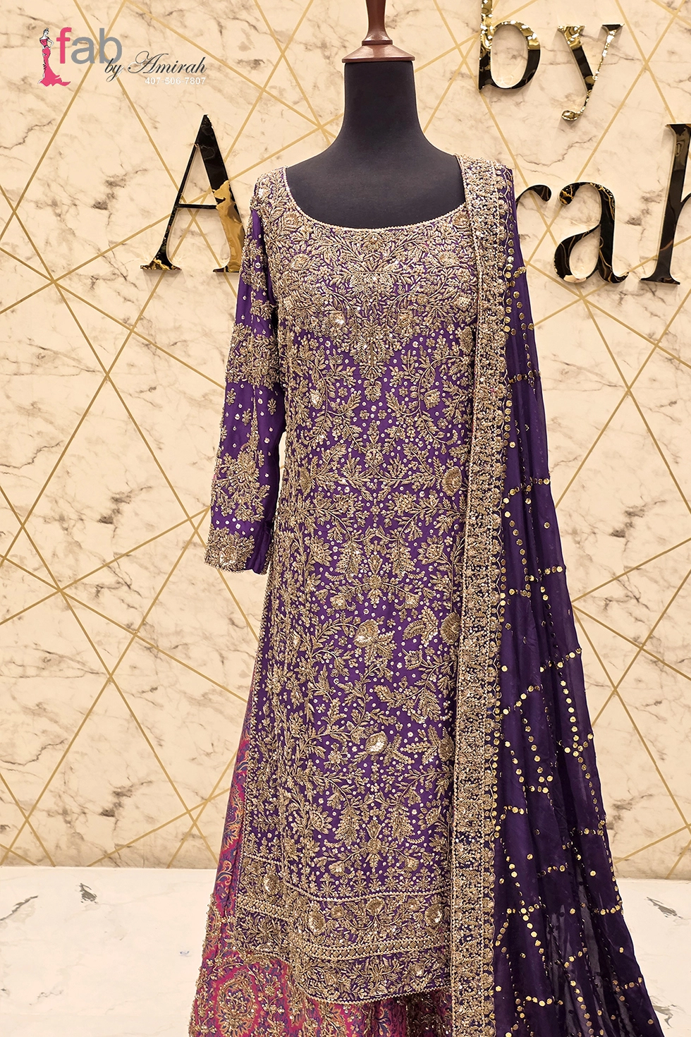Front view of deep purple long shirt and wide pants outfit