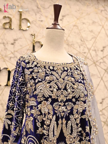 Close-up of handcrafted Zardozi and Dabka work on long back tail lehenga shirt