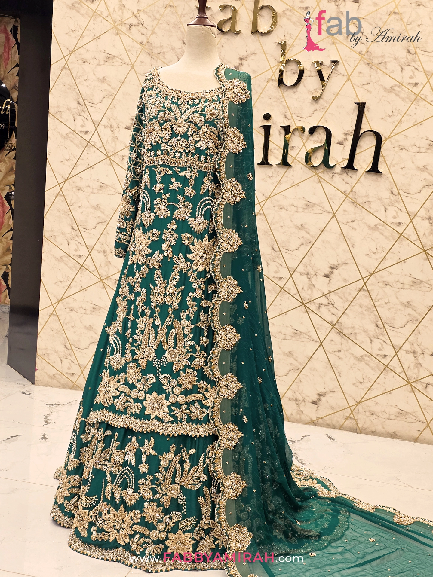 Green bridal lehenga with long shirt and gold zardozi by Fab By Amirah Green bridal lehenga with long shirt and gold zardozi by Fab By Amirah