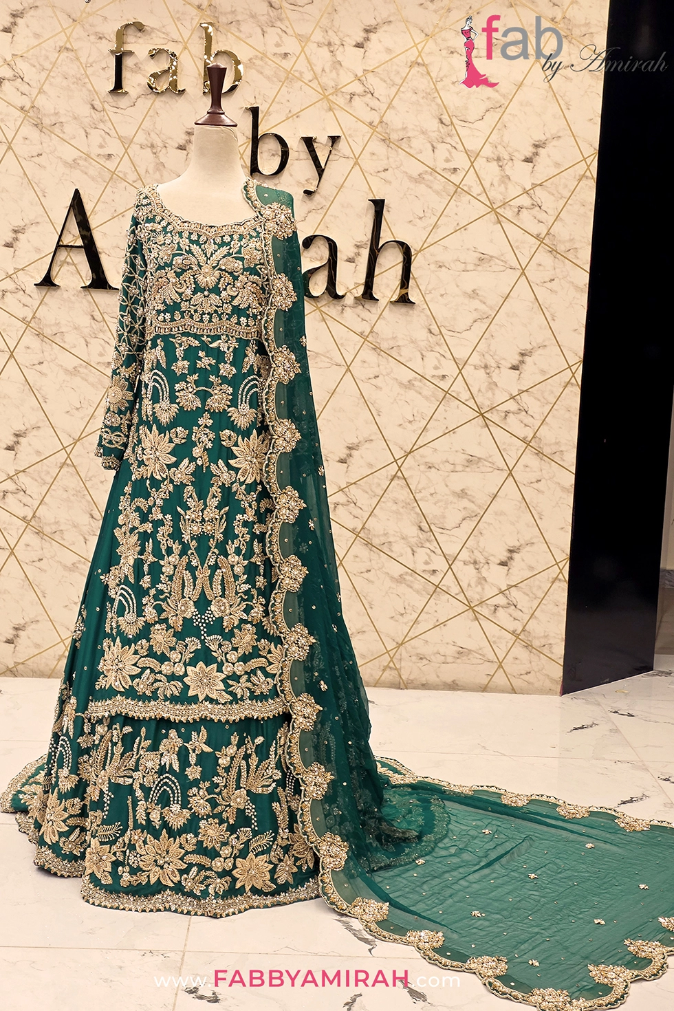 Full length view of green embellished shirt with flared lehenga and drape dupatta