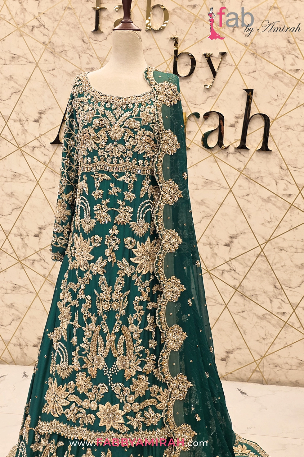 Medium shot focusing on embellished neckline, shirt embroidery, and dupatta edging