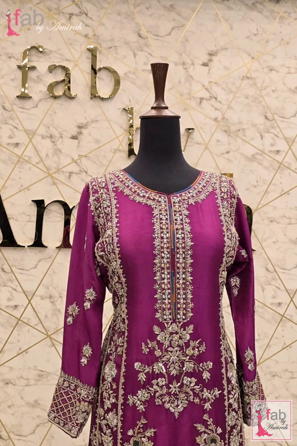 Upper bodice close up featuring embellished neckline and floral hand embroidery patterns Upper bodice close up featuring embellished neckline and floral hand embroidery patterns