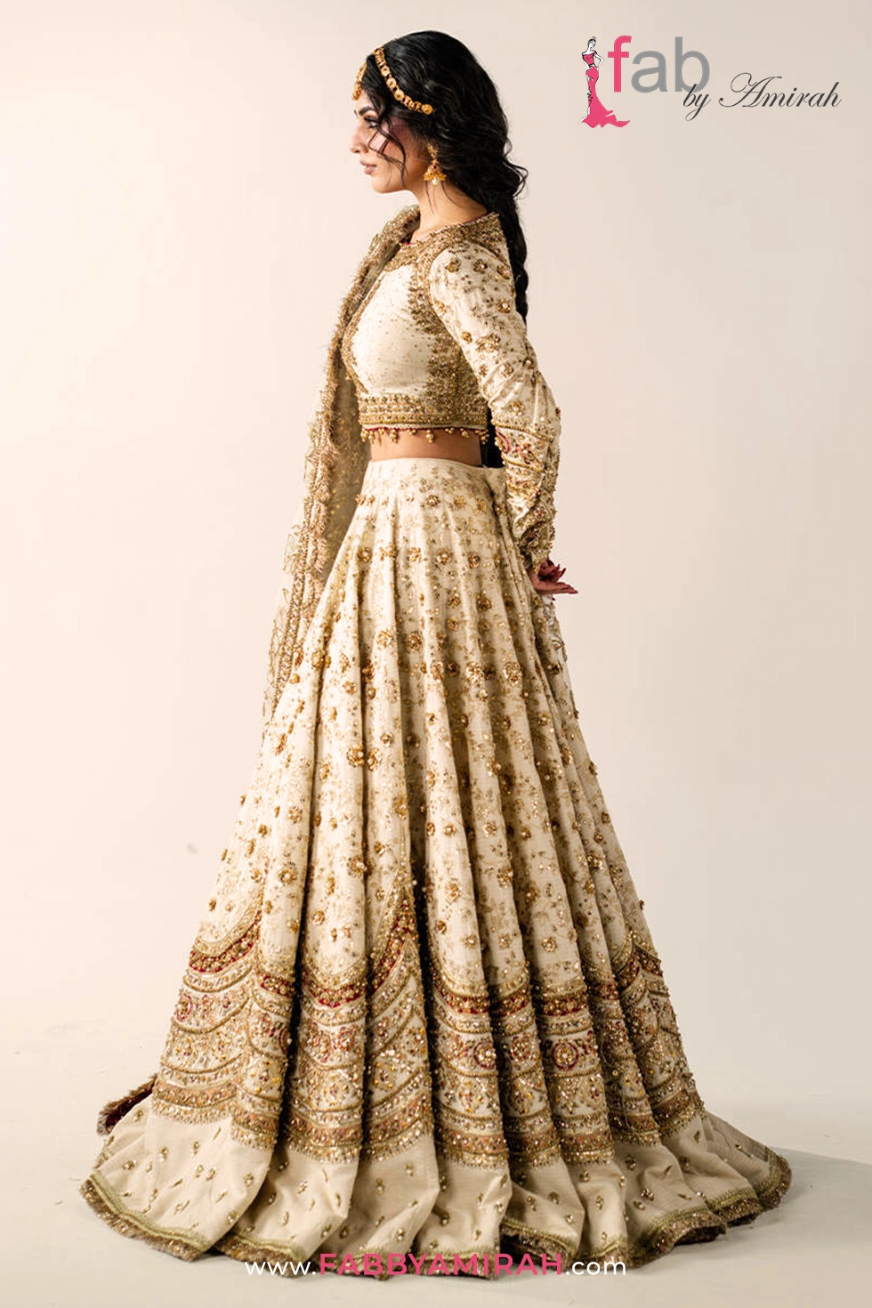 Side view of ivory choli and off white gold bridal lehenga embroidery pattern