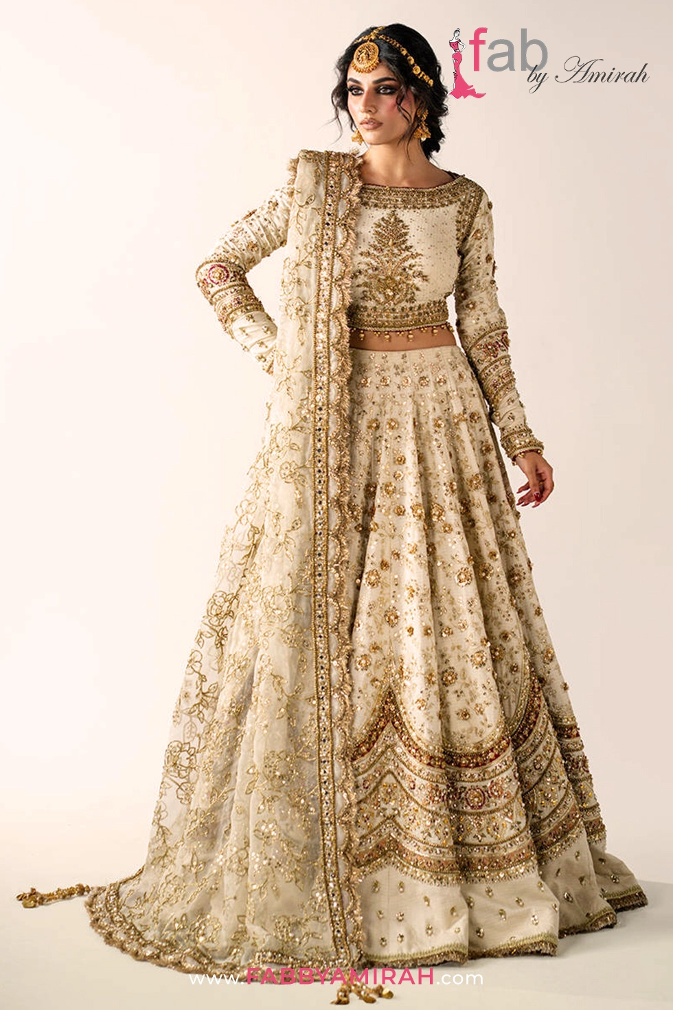 Off white gold bridal lehenga in tilla karandi with red jamawar borders by Fab By Amirah