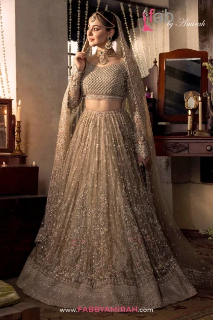 Beige bridal lehenga for Barat with heavy handwork tissue